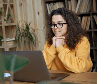 Girl looking at laptop