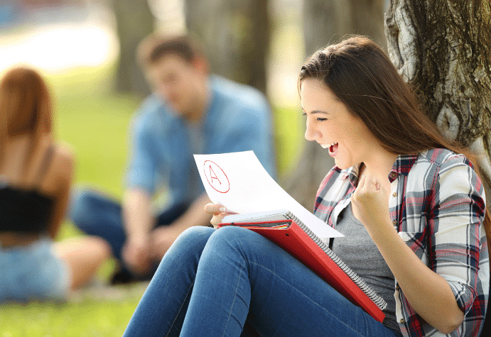 Girl celebrating a good grade